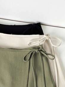 Franclia 毕业装休闲百搭吊带不对称下摆新款夏款卡其色纹理宽面料裙子女士短裙女裙女士夏装夏装下装