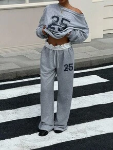 SHEIN EZwear Conjunto de 2 piezas con top de manga larga con estampado de letras y números en cuello asimétrico y pantalones largos con cordón en la cintura para mujer