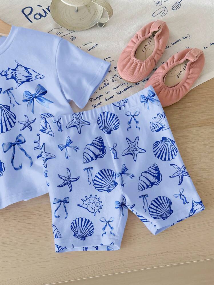 SHEIN Bộ đồ thể thao cho bé gái gồm áo thun tay ngắn cổ tròn dáng rộng và quần short bó sát in hình sinh vật biển dễ thương, vỏ sò và nơ, thích hợp cho mùa xuân/hè. - Nhiều màu - Xem 5