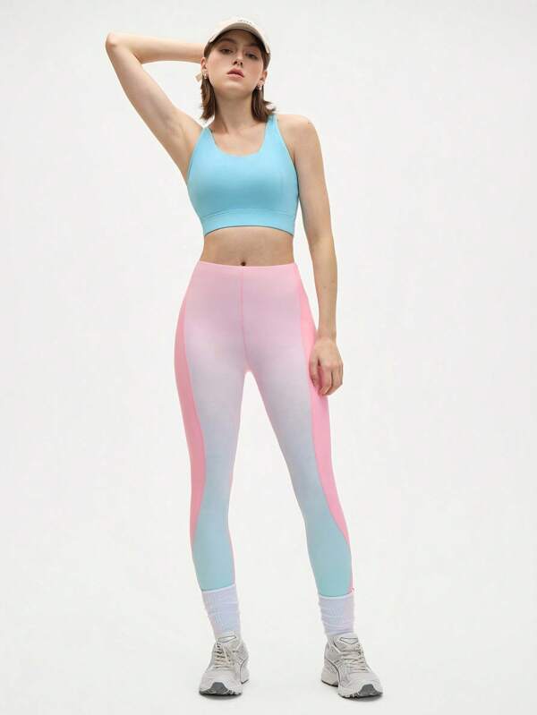 Easify SHEIN Sport Conjunto deportivo de chaleco sin espalda y leggings de color contrastante para mujer