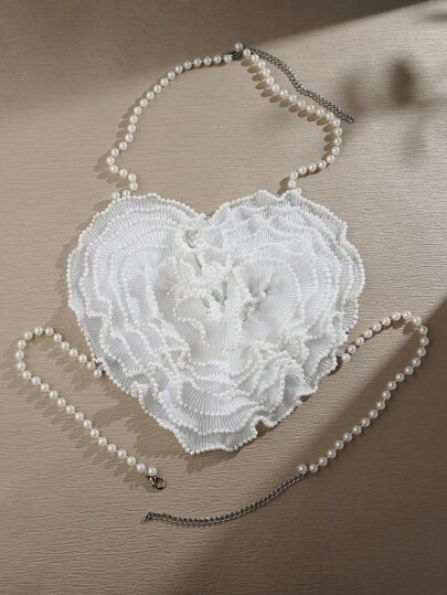 SHEIN 心形花卉图案珍珠装饰上衣，适合派对、俱乐部、音乐节晚宴和其他活动。