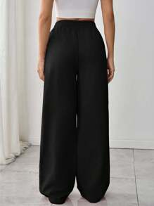 EURMUSE Women's Straight Leg Sport Pants With Pocket And Stitching Detail - Black - View 3