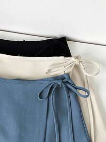 Franclia 毕业装休闲百搭吊带不对称下摆新款夏款卡其色纹理宽面料裙子女士短裙女裙女士夏装夏装下装休闲装春季