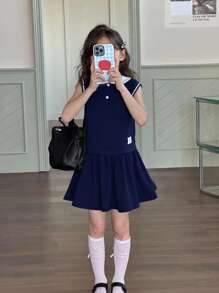 Completo casual e sportivo da ragazza preadolescente, composto da polo smanicata con contrasto di colori e gonna con stampa a ombrello, set di t-shirt versatile per uso quotidiano - Blu Navy - Visualizzare 1