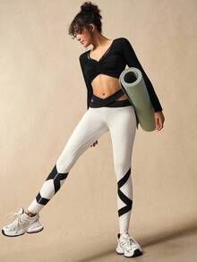VARSIVA Women's Contrast Color Waist Hollow Out Sports Leggings - Black and White - View 6