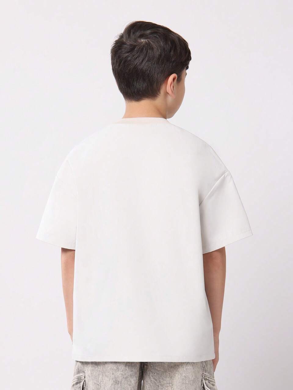 Camiseta extragrande con estampado de texto de Studios y hombros caídos