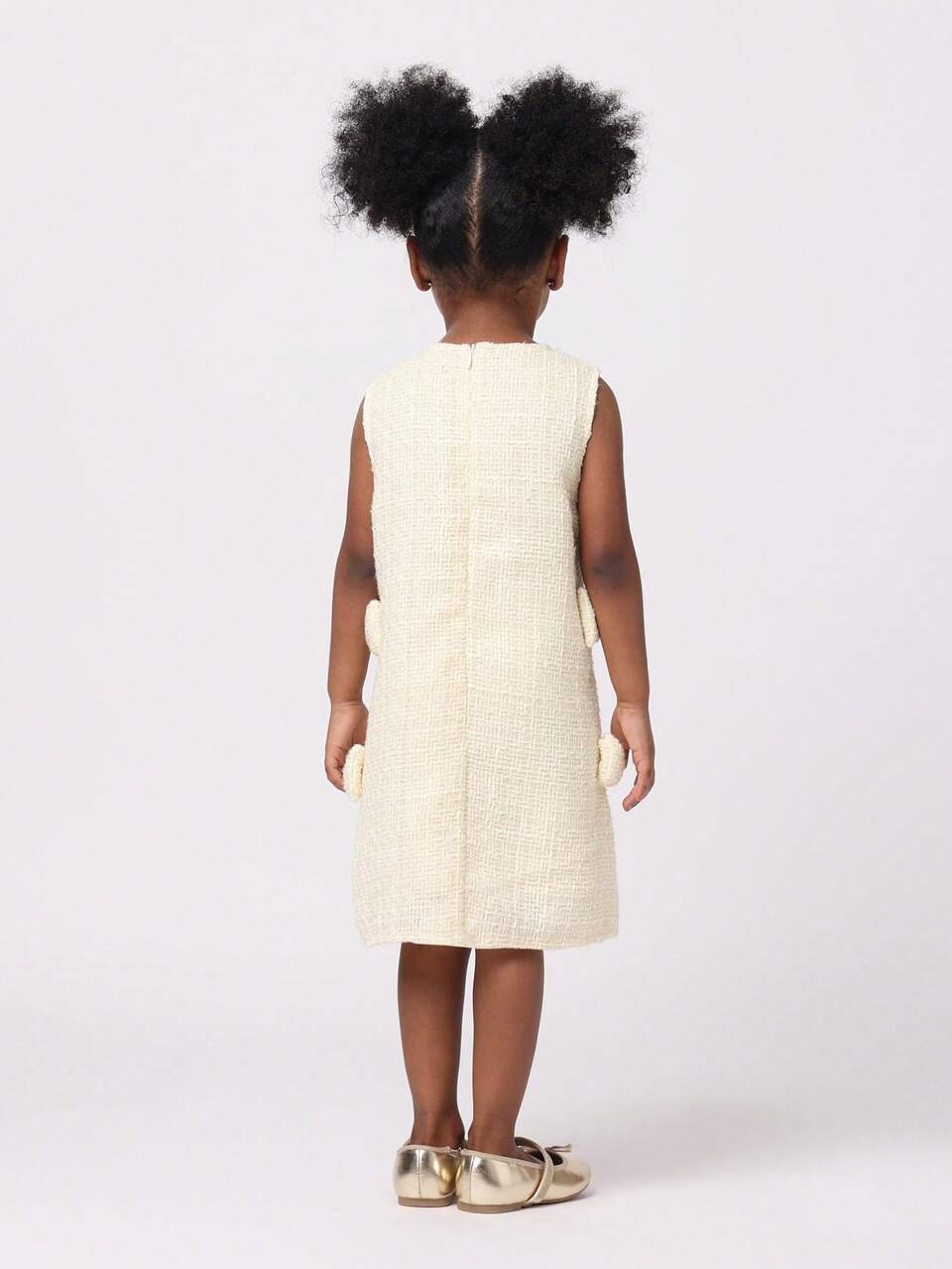 Vestido sem mangas com decote bouclé e detalhes de laço lateral
