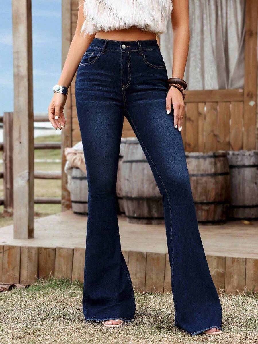 SHEIN Jeans acampanados con bolsillos de tela elástica para mujer de talla grande