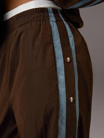 Athîral Pantalones casuales anchos de cintura elástica con rayas laterales para mujer