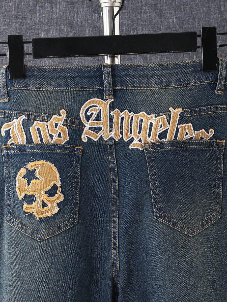 SHEIN Calça jeans folgada e confortável para adolescente, estilo vintage Y2K, ideal para o dia a dia escolar, faculdade, com estampa gótica de caveiras e patchwork, perfeita para o Halloween. Ideal para usar em casa, festivais rave e até mesmo em casa. Perfeita para o inverno e outono. - Azul - Ver 1