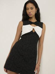 Nöista A Black Fitted Mini Dress With Contrasting White Bow Details On The Chest And Shoulders, Showcasing A Sleeveless, All Women Clothes, Fall Outfits, Autumn, Back To School, School Clothes, Concert Outfit, Office, Casual, Cute, Western, Boho, Bohemian, Halloween Clothes. - Black and White - View 6