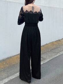 FRIFUL 女式黑色纯色拼接透明蕾丝面料收腰长袖连体裤，秋季