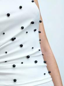 Maija Women's Black Pearl Studded Sleeveless Top With Cutout Detail And White Side Stripe Elastic Waistband Skirt, Versatile Elegant Urban Design, Knit Ribbed Fabric, Sleeveless Crew Neck Top And Medium/Low Rise Waistband Skirt, Business Casual Countryside Music Festival Graceful Outfit, Cruise Dress - White - View 5