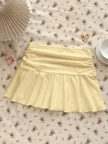 少女黄色针织休闲百搭镂空纹理褶皱 A 字迷你裙，适合夏季