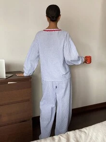 Bộ đồ ngủ nữ cổ thắt nơ vải kẻ caro xếp ly màu tương phản, trang phục thu đông - Màu xanh lam - Xem 2