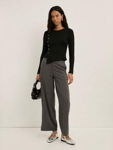 Nöista Ribbed Long-Sleeve Top With An Asymmetric Row Of Statement Buttons Running Down The Side, Designed With A Fitted Silhouette That Adds A Modern And Elegant Touch To Women's Winter Outfits, Perfect For Polished Everyday Looks, Christmas Gatherings And Refined New Year Styling. - Black - View 6