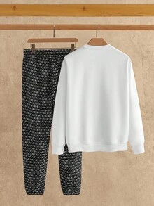 Manfinity VCAY Bộ 2 quần nỉ và áo nỉ có dây rút thường ngày dành cho nam, bộ đồ thường ngày xuân/thu dành cho nam, bộ đồ 2 màu đen trắng dành cho nam, bộ đồ thể thao nam, bộ đồ họa tiết dành cho nam, dành cho mùa thu đông - trắng - Xem 2
