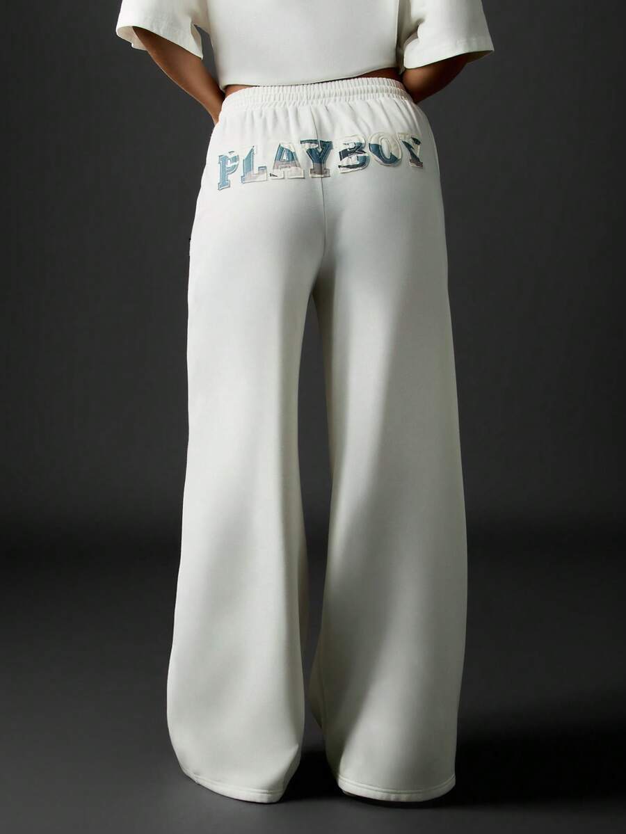 Missguided x Playboy Pantalones de chándal de pierna ancha con logo y texto, ropa de estar en casa cómoda con cintura elástica y cordón, cálidos y casuales para otoño e invierno - Blanco - Ver 1