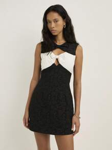 Nöista A Black Fitted Mini Dress With Contrasting White Bow Details On The Chest And Shoulders, Showcasing A Sleeveless, All Women Clothes, Fall Outfits, Autumn, Back To School, School Clothes, Concert Outfit, Office, Casual, Cute, Western, Boho, Bohemian, Halloween Clothes. - Black and White - View 1
