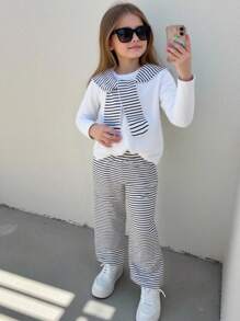 Set di top a collo alto casual tinta unita e pantaloni a zampa d'elefante a righe con shawl a strisce