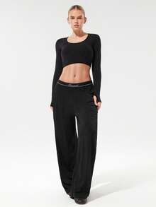 GLOWMODE Second-Skin 无缝交叉露背圆领短款长袖上衣，带拇指孔，低冲击瑜伽普拉提工作室日常休闲装，可拆卸罩杯 - 黑色 - 查看 6