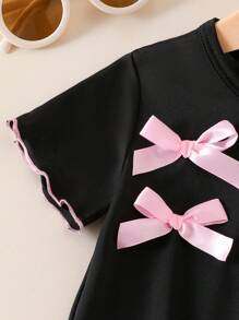 Elladie kids Adorable Two-Piece Black Baby Girls Outfit With Ruffled Edges And Round Neck Design