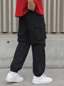 Calça cargo preta para meninos adolescentes com bolsos 3D, estilo casual universitário, confortável e moderno, versátil para uso diário, escola, viagens, atividades ao ar livre