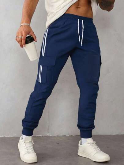 Manfinity Homme 条纹印花抽绳腰部插袋休闲慢跑运动裤男士海军蓝慢跑裤男士工装运动裤男士运动裤男士侧条纹慢跑裤男士运动裤。送给男朋友或丈夫的绝佳礼物。