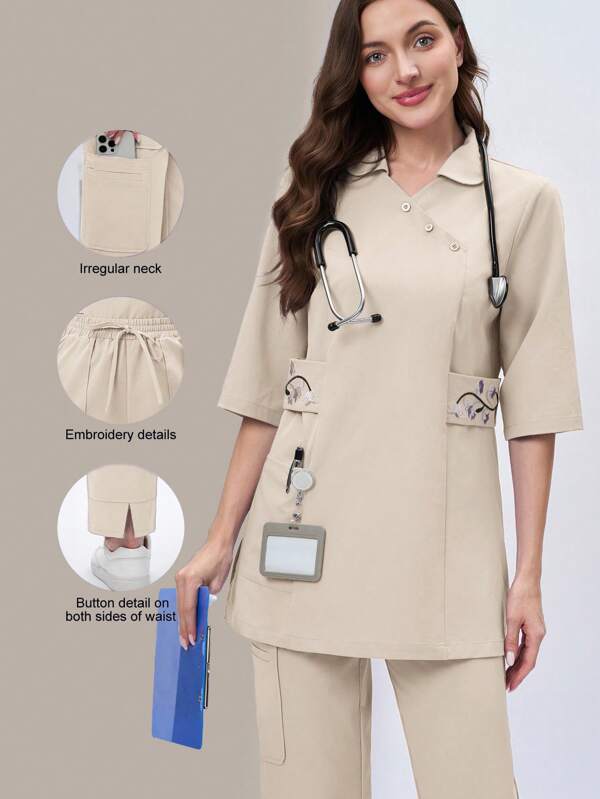 Scrubzie Top de blouse de travail asymétrique à col brodé