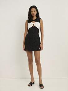 Nöista A Black Fitted Mini Dress With Contrasting White Bow Details On The Chest And Shoulders, Showcasing A Sleeveless, All Women Clothes, Fall Outfits, Autumn, Back To School, School Clothes, Concert Outfit, Office, Casual, Cute, Western, Boho, Bohemian, Halloween Clothes. - Black and White - View 5