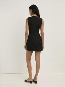 Nöista A Black Fitted Mini Dress With Contrasting White Bow Details On The Chest And Shoulders, Showcasing A Sleeveless, All Women Clothes, Fall Outfits, Autumn, Back To School, School Clothes, Concert Outfit, Office, Casual, Cute, Western, Boho, Bohemian, Halloween Clothes. - Black and White - View 2
