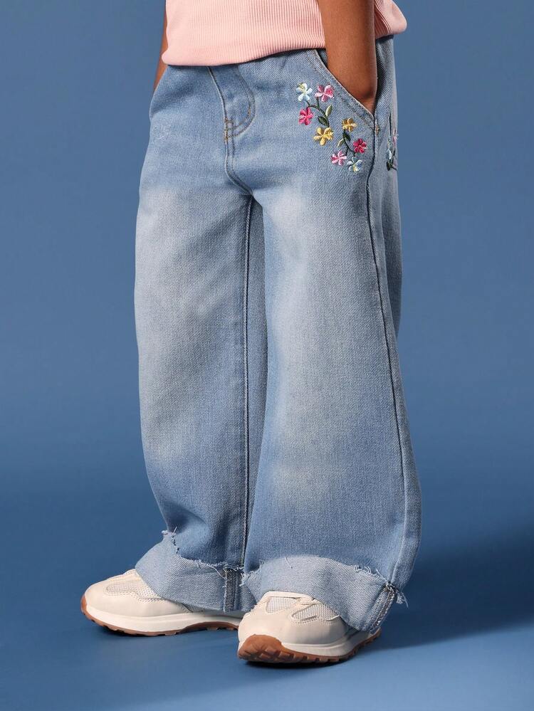 Jean en denim à jambe large avec détails de broderie florale