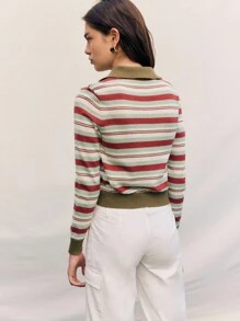 Nöista 条纹针织开衫，长袖，经典领口，前襟纽扣设计，是一款百搭的复古风外套，非常适合女性冬季服装、轻松休闲的造型、精致的日常装扮、节日圣诞装扮和轻松的新年装束。