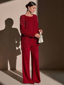 CLARA VERO Completo di maglione in maglia cremosa e pantaloni a gamba ampia