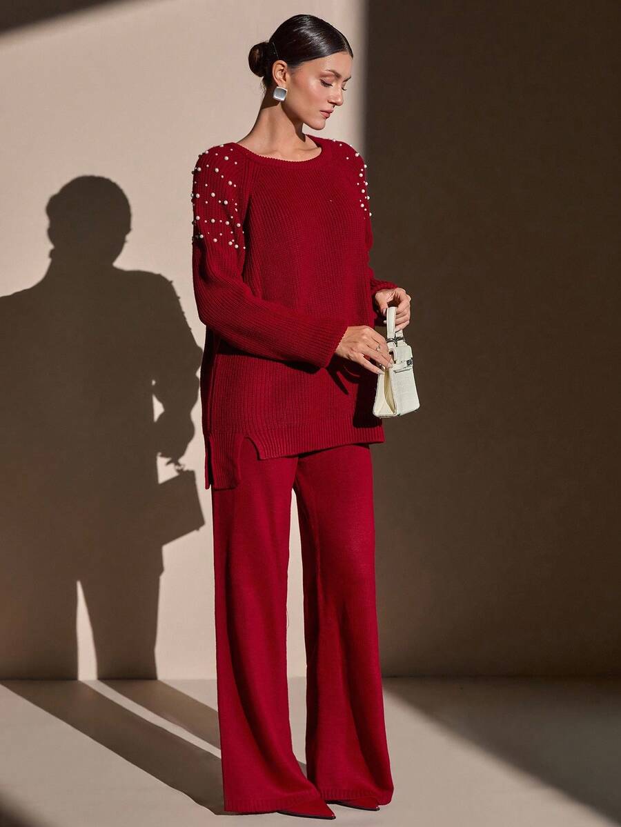 CLARA VERO Completo di maglione in maglia cremosa e pantaloni a gamba ampia