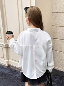 SHEIN Serisse Kids بلوزة بيضاء فضفاضة للبنات المراهقات، طويلة الأكمام، ياقة مفرودة، فتحة خلفية، مناسبة للارتداء اليومي والعودة للمدرسة - أبيض - مشاهدة 6
