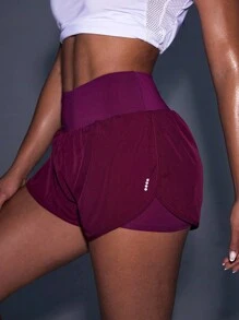 Powerista 宽腰海豚下摆运动短裤毛衣短裤