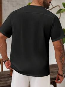 Manfinity Homme Camisa casual de manga corta con cuello en V de unicolor para hombres de talla grande - Negro - Ver 2