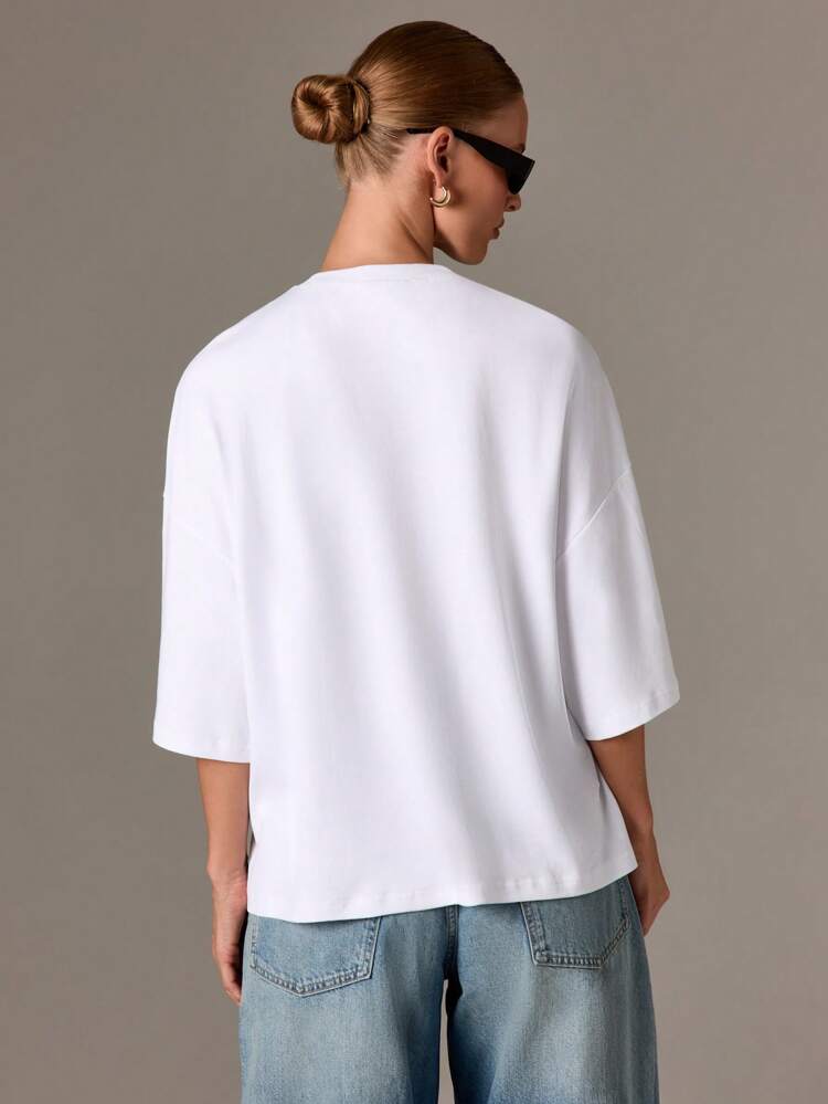 Oversized T-Shirt With Pearl And Rhinestone Embellishments