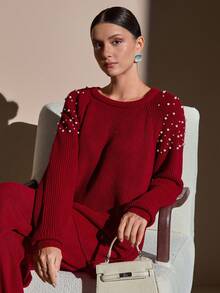 CLARA VERO Completo di maglione in maglia cremosa e pantaloni a gamba ampia