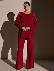 CLARA VERO Completo di maglione in maglia cremosa e pantaloni a gamba ampia