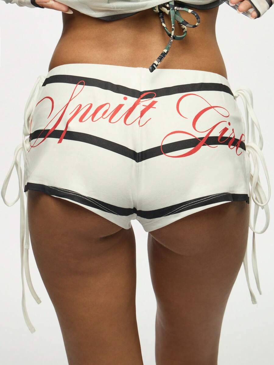 SUMWON WOMEN Spoilt Girl Printed Side Tie Booty Shorts Mini Hot Pants - Festival Party Club Summer Beachwear Bottoms With Side Strings Adjustable Design - White - View 1