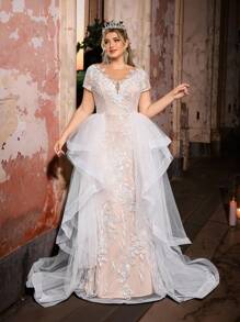 Glamrae Vestido de novia romántico de talla grande con elegante y lujoso bordado de lentejuelas, mangas de casquillo, bajo de cola de pez, costuras asimétricas con volantes y pieza flotante adecuado para vacaciones, luna de miel, eventos de boda y novia - Blanco - Ver 4