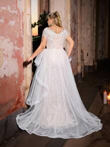 Glamrae Vestido de novia romántico de talla grande con elegante y lujoso bordado de lentejuelas, mangas de casquillo, bajo de cola de pez, costuras asimétricas con volantes y pieza flotante adecuado para vacaciones, luna de miel, eventos de boda y novia - Blanco - Ver 3