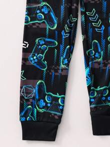 SHEIN Set de pijama suave y cómodo con camiseta de manga larga con cuello redondo y pantalones con estampado de consola de juegos que brilla en la oscuridad para niño preadolescente, 2 piezas - Negro - Ver 5