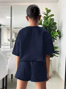 SHEIN 2 件套青少年女孩宽松短款 T 恤 + 紧身短裤，休闲日常百搭服装