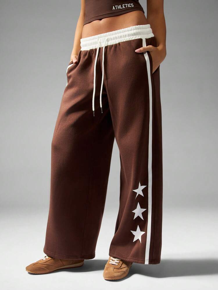 MISSGUIDED Wide Leg Star Print Jogger Pants Elastic Waist Drawstring Casual Bottoms High Rise Streetwear Side Stripe Varsity Design Fall Winter Loungewear Retro Style