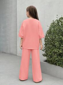 SHEIN Nova Glow 2pcs Tween Girl Set: Casual Letter Print Loose Fit Crew Neck T-Shirt + Printed Pants