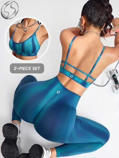 Innovista Conjunto de entrenamiento sin costuras con efecto tie-dye Aurora. Ropa deportiva de secado rápido para yoga, pilates, HIIT, running, boxeo y gimnasio. Incluye top con protección UV y leggings con control de abdomen y compresión. Ideal para actividades al aire libre, ejercicio y vida diaria. Diseño versátil y duradero en tonos azules claros.