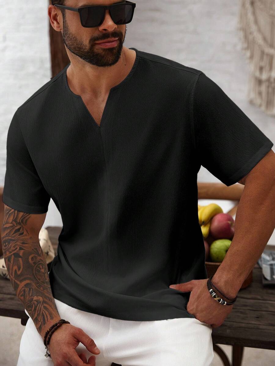 Manfinity Homme Camisa casual de manga corta con cuello en V de unicolor para hombres de talla grande - Negro - Ver 1